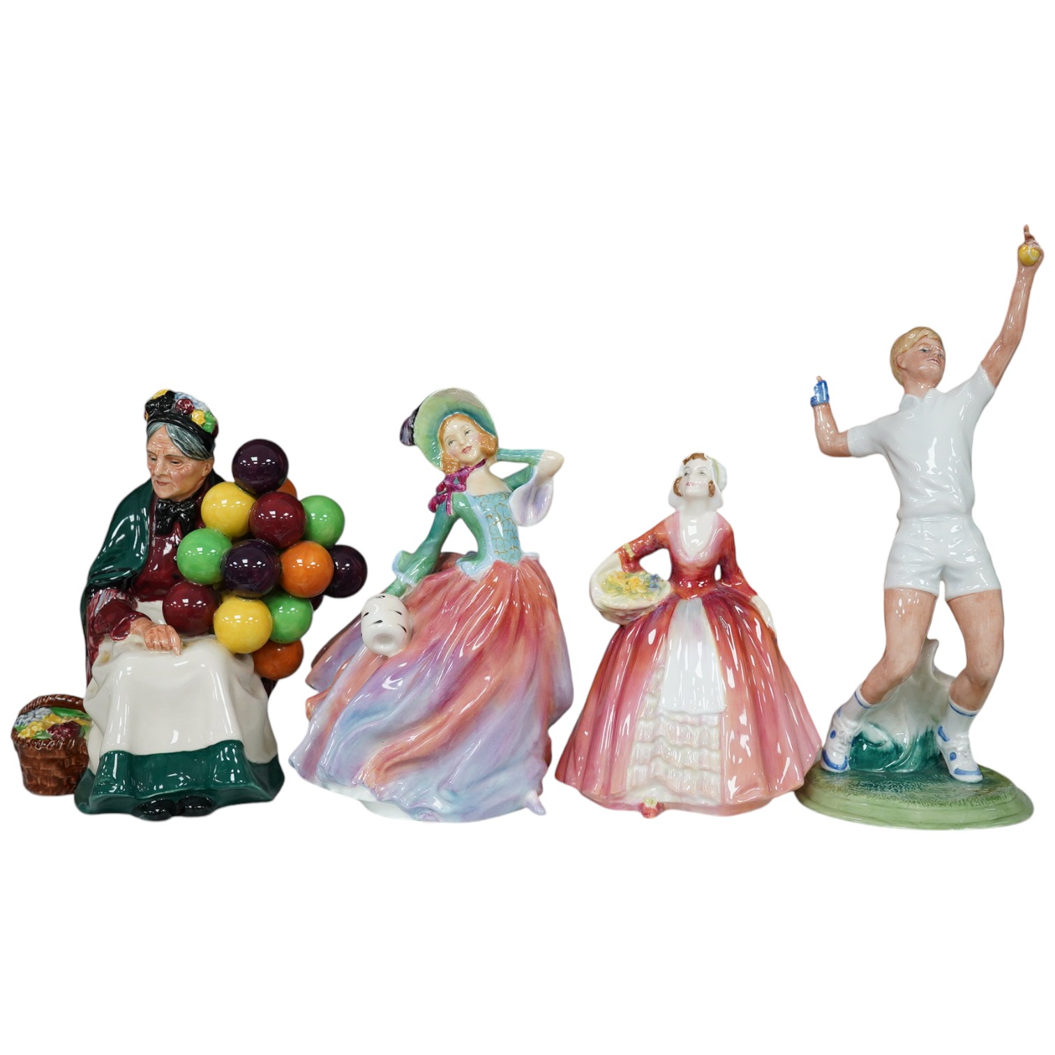 Four Royal Doulton figures to include The Ace HN 3398, Autumn Breezes HN 1911, Janet HN 1537 and The Old Balloon Seller HN 1315. Condition - good